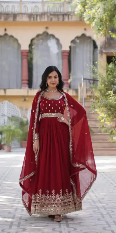 KA 1144 Maroon Faux Blooming Gown with Embroidery Work & Zari Work. Exclusive Offer ₹2449. Delivery 4-6 Working Days. Shop now. | Bollywood Gowns, Creative Gowns, Designer Gowns, Embroidered Gowns, Gowns, Party Wear Gowns