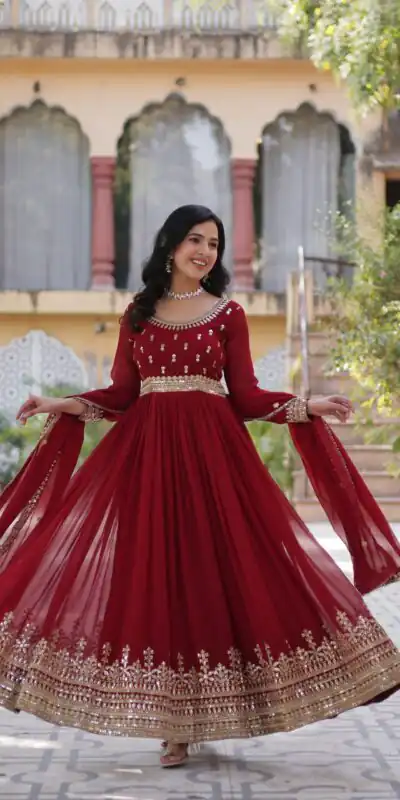 KA 1144 Maroon Faux Blooming Gown with Embroidery Work & Zari Work. Exclusive Offer ₹2449. Delivery 4-6 Working Days. Shop now. | Bollywood Gowns, Creative Gowns, Designer Gowns, Embroidered Gowns, Gowns, Party Wear Gowns