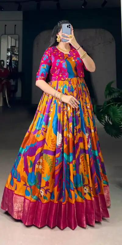 YNF 5035 Mustard in Taser Silk Zari Work & Kalamkari Print Gown . Available at ₹1799 only. Delivery 4-6 Working Days. Shop now. | Bollywood Gowns, Creative Gowns, Designer Gowns, Embroidered Gowns, Gowns, Party Wear Gowns