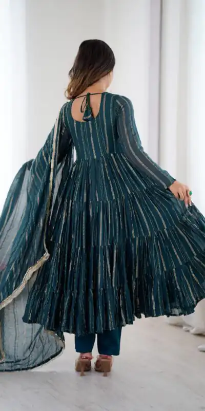 SRK 5305 Peacock Blue Color Mal Chanderi Gown with Mirror Work & Lace Work. Grab it for ₹2399. Delivery 4-6 Working Days. Shop now. | Bollywood Gowns, Creative Gowns, Designer Gowns, Embroidered Gowns, Gowns, Party Wear Gowns