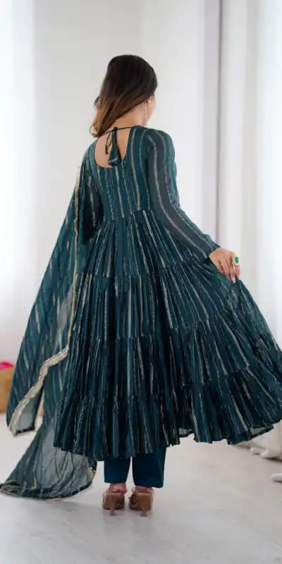 SRK 5305 Peacock Blue Color Mal Chanderi Gown with Mirror Work & Lace Work. Grab it for ₹2399. Delivery 4-6 Working Days. Shop now. | Bollywood Gowns, Creative Gowns, Designer Gowns, Embroidered Gowns, Gowns, Party Wear Gowns