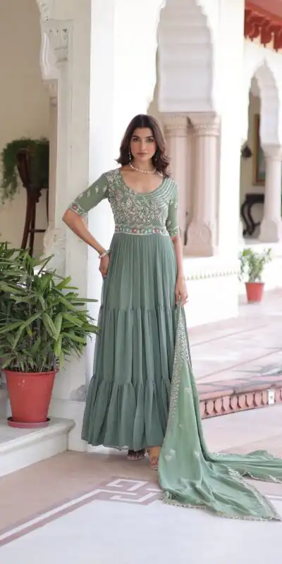 KA 1213 Pista Faux Blooming Gown with Embroidery Work & Sequins Work. Best Price ₹2449. Delivery 4-6 Working Days. Shop now. | Bollywood Gowns, Creative Gowns, Designer Gowns, Embroidered Gowns, Gowns, Party Wear Gowns