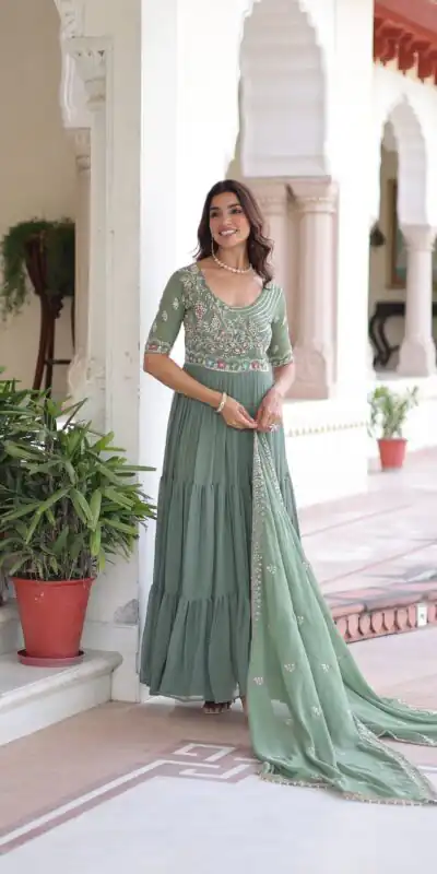 KA 1213 Pista Faux Blooming Gown with Embroidery Work & Sequins Work. Best Price ₹2449. Delivery 4-6 Working Days. Shop now. | Bollywood Gowns, Creative Gowns, Designer Gowns, Embroidered Gowns, Gowns, Party Wear Gowns