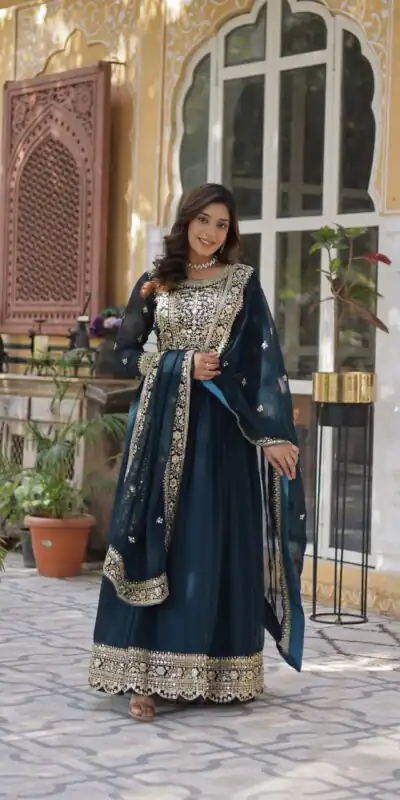 KA 1153 Teal Faux Blooming Gown with Embroidery Work & Zari Work. Available at ₹2599 only. Delivery 4-6 Working Days. Shop now. | Bollywood Gowns, Creative Gowns, Designer Gowns, Embroidered Gowns, Gowns, Party Wear Gowns
