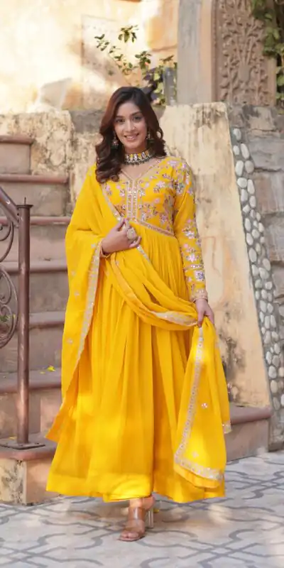 KA 1147 Yellow in Color Faux Blooming Embroidery Work & Zari Work Gown . Grab it for ₹2049. Delivery 4-6 Working Days. Shop now. | Bollywood Gowns, Creative Gowns, Designer Gowns, Embroidered Gowns, Gowns, Party Wear Gowns