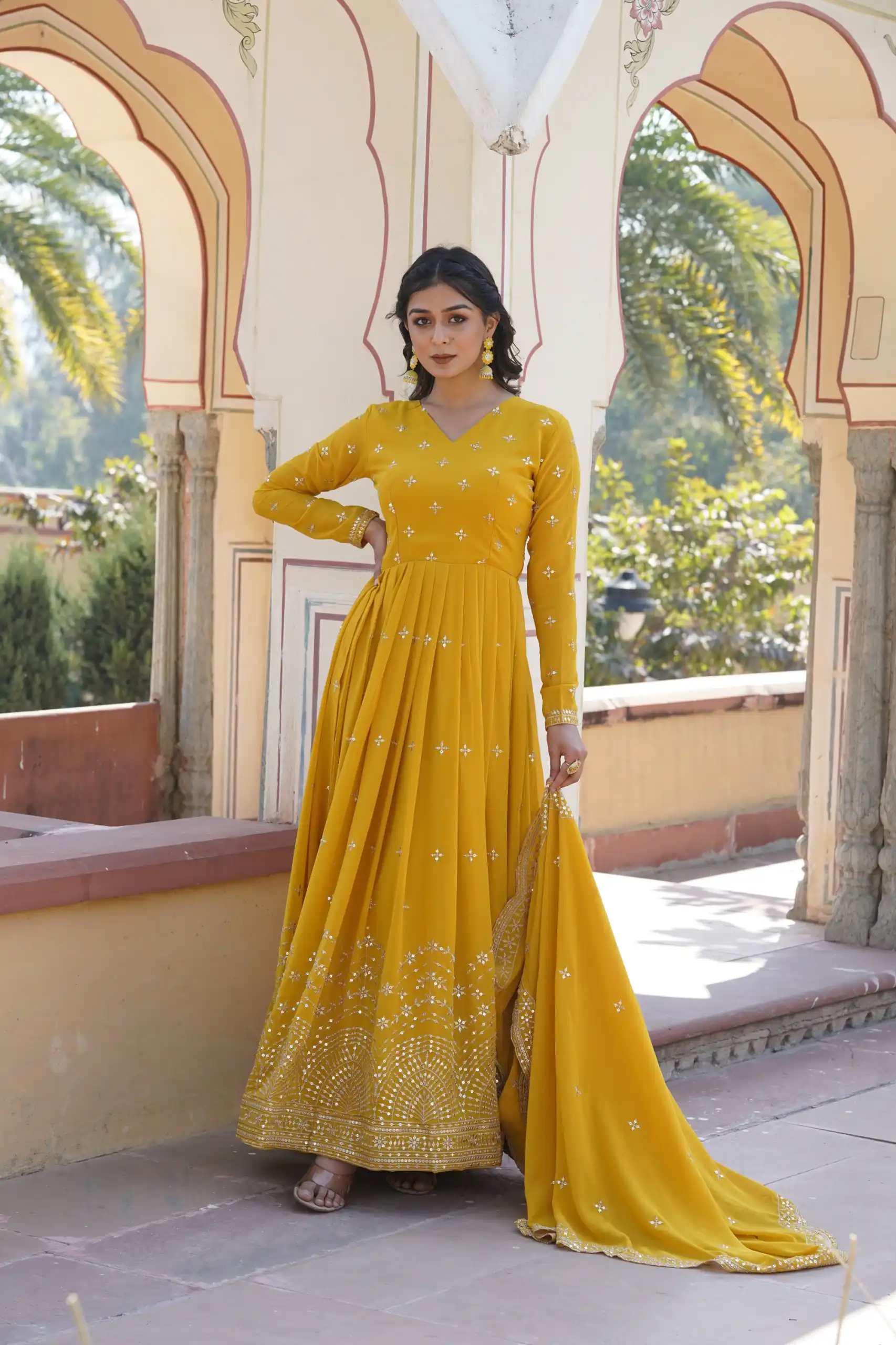 KA 1084 Yellow Faux Georgette Gown Perfect for Wedding, Party, Pooja, Festival Celebrations, Bridal Wear – . Festive Deal ₹2649. Delivery 4-6 Working | Bollywood Gowns, Creative Gowns, Designer Gowns, Embroidered Gowns, Gowns, Party Wear Gowns