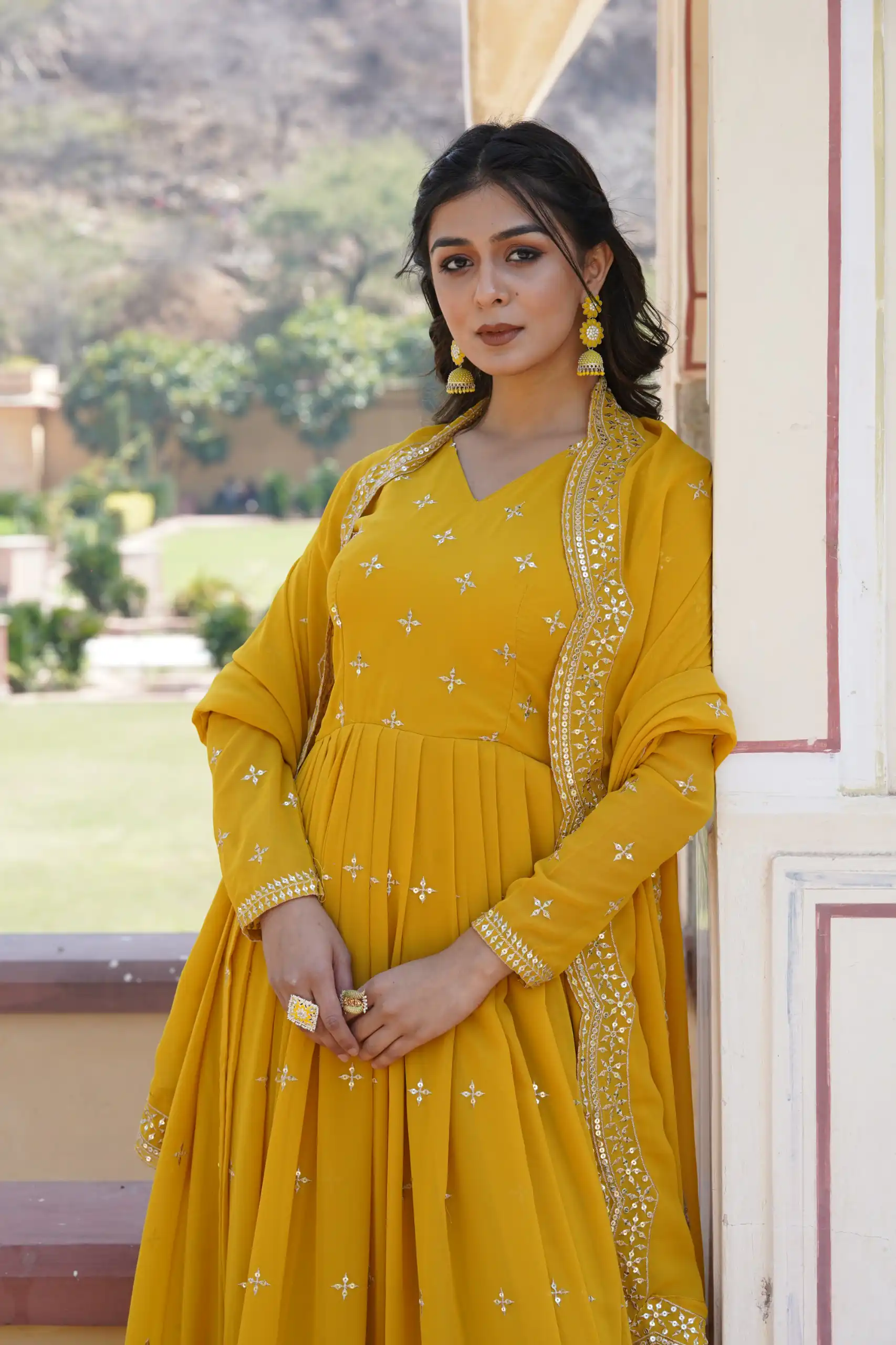 KA 1084 Yellow Faux Georgette Gown Perfect for Wedding, Party, Pooja, Festival Celebrations, Bridal Wear – . Festive Deal ₹2649. Delivery 4-6 Working | Bollywood Gowns, Creative Gowns, Designer Gowns, Embroidered Gowns, Gowns, Party Wear Gowns