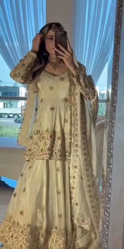 ST 1159 Cream Chinon Lehenga Choli with Embroidery Work & Mirror Work. Grab it for ₹2549. Delivery 4-6 Working Days. Shop now. | Bollywood Lehenga, Creative Lehenga, Designer Lehenga, Embroidered Lehenga, Lehenga, Party Wear Lehenga