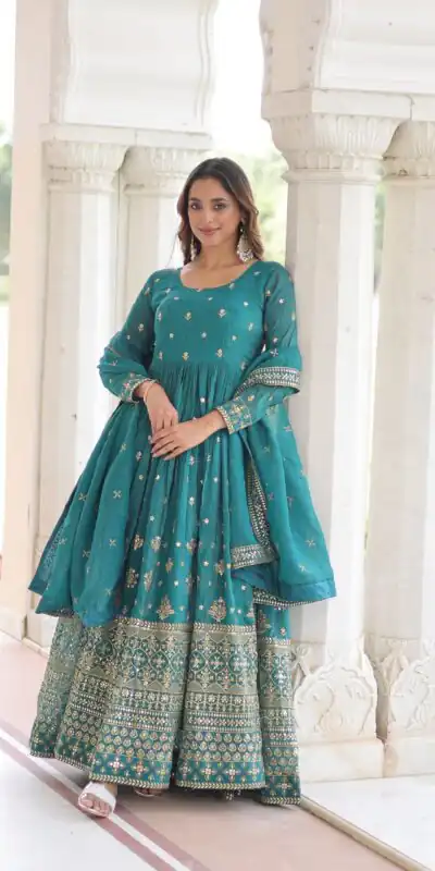 EKA 1216 Firozi in Silver Crunchy mbroidery Work & Sequins Work Gown . Available at ₹2649 only. Delivery 4-6 Working Days. Shop now. | Bollywood Gowns, Creative Gowns, Designer Gowns, Embroidered Gowns, Gowns, Party Wear Gowns