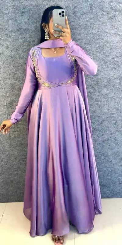 MF 888 Lavender Rangoli Silk Gown with Lace Border & Lace Work. Available at ₹1649 only. Delivery 4-6 Working Days. Shop now. | Bollywood Gowns, Creative Gowns, Designer Gowns, Embroidered Gowns, Gowns, Party Wear Gowns