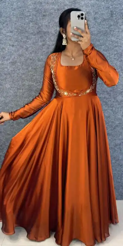 MF 888 Orange Rangoli Silk Gown with Lace Border & Lace Work. Available at ₹1649 only. Delivery 4-6 Working Days. Shop now. | Bollywood Gowns, Creative Gowns, Designer Gowns, Embroidered Gowns, Gowns, Party Wear Gowns