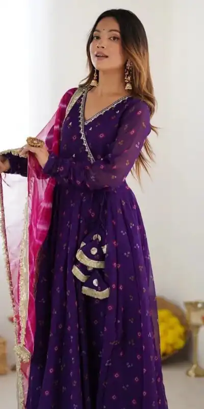 ST 1116 Purple Faux Georgette Gown with Digital Print & Embroidery Work. Exclusive Offer ₹1999. Delivery 4-6 Working Days. Shop now. | Bollywood Gowns, Creative Gowns, Designer Gowns, Embroidered Gowns, Gowns, Party Wear Gowns