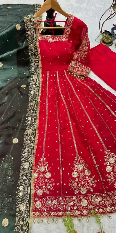 VLM 313 Red JC Silk Gown. Perfect for Wedding, Party, Sangeet, Baisakhi, Diwali – Introductory Price ₹2599. Delivery 4-6 Working Days. Shop now. | Bollywood Gowns, Creative Gowns, Designer Gowns, Embroidered Gowns, Gowns, Party Wear Gowns