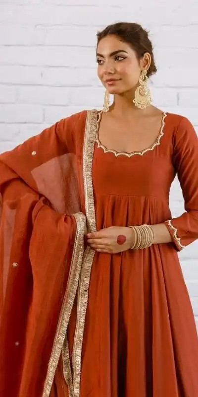 SRk 5324 Rust Color Vichitra silk Gown with Bead Work & Lace Work. Now at just ₹1849. Delivery 4-6 Working Days. Shop now. | Bollywood Gowns, Creative Gowns, Designer Gowns, Embroidered Gowns, Gowns, Party Wear Gowns