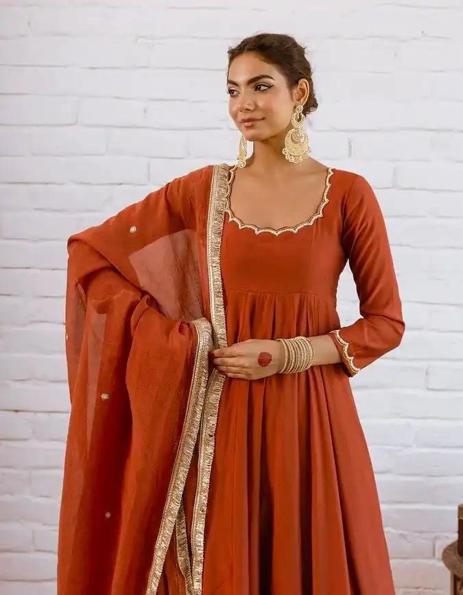 SRk 5324 Rust Color Vichitra silk Gown with Bead Work & Lace Work. Now at just ₹1849. Delivery 4-6 Working Days. Shop now. | Bollywood Gowns, Creative Gowns, Designer Gowns, Embroidered Gowns, Gowns, Party Wear Gowns