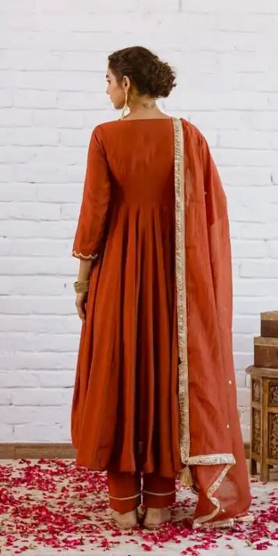 SRk 5324 Rust Color Vichitra silk Gown with Bead Work & Lace Work. Now at just ₹1849. Delivery 4-6 Working Days. Shop now. | Bollywood Gowns, Creative Gowns, Designer Gowns, Embroidered Gowns, Gowns, Party Wear Gowns