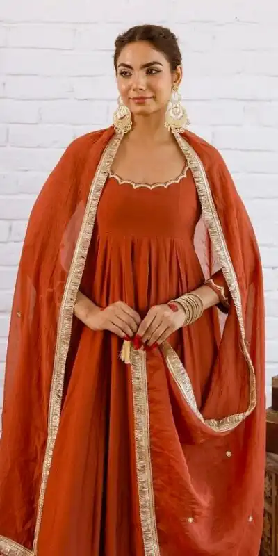 SRk 5324 Rust Color Vichitra silk Gown with Bead Work & Lace Work. Now at just ₹1849. Delivery 4-6 Working Days. Shop now. | Bollywood Gowns, Creative Gowns, Designer Gowns, Embroidered Gowns, Gowns, Party Wear Gowns