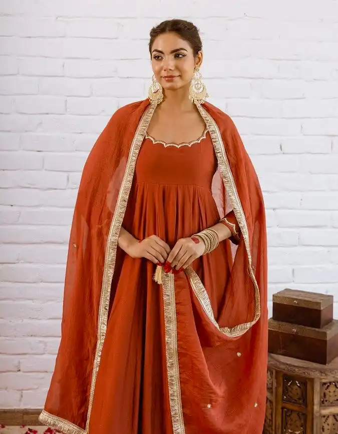 SRk 5324 Rust Color Vichitra silk Gown with Bead Work & Lace Work. Now at just ₹1849. Delivery 4-6 Working Days. Shop now. | Bollywood Gowns, Creative Gowns, Designer Gowns, Embroidered Gowns, Gowns, Party Wear Gowns