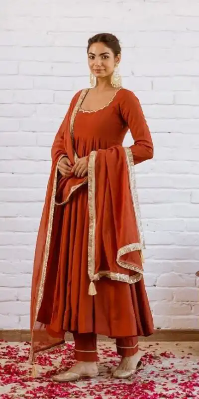 SRk 5324 Rust Color Vichitra silk Gown with Bead Work & Lace Work. Now at just ₹1849. Delivery 4-6 Working Days. Shop now. | Bollywood Gowns, Creative Gowns, Designer Gowns, Embroidered Gowns, Gowns, Party Wear Gowns
