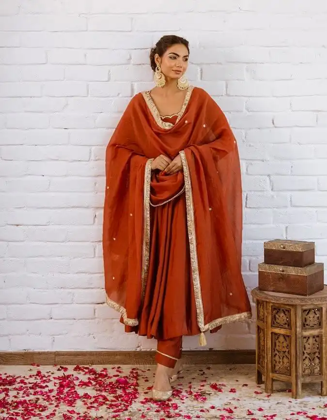 SRk 5324 Rust Color Vichitra silk Gown with Bead Work & Lace Work. Now at just ₹1849. Delivery 4-6 Working Days. Shop now. | Bollywood Gowns, Creative Gowns, Designer Gowns, Embroidered Gowns, Gowns, Party Wear Gowns