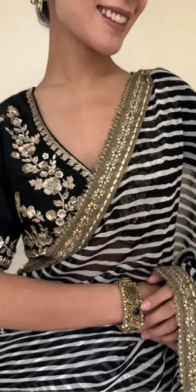 NC 5553 Black Faux Georgette Saree Perfect for Wedding, Party, Bridal Wear, Baisakhi, Raksha Bandhan –. Introductory Price ₹1899. Delivery 4-6 Workin | Creative Sarees, Bollywood Sarees, Designer Sarees, Embroidered Sarees, Ethnic Saree, Modern Digital sarees, Party Wear Sarees, Sarees