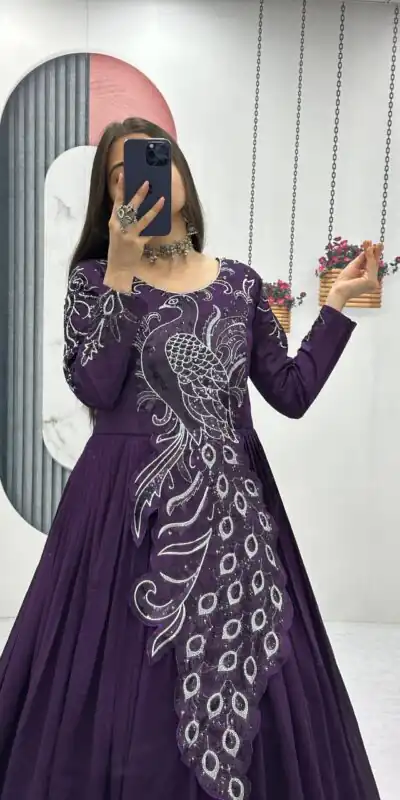PC 564 Dark Purple Vichitra Silk Gown Perfect for Wedding, Party, Holi, Anniversary, Mehendi –. Grab it for ₹2049. Delivery 4-6 Working Days. Shop now. | Bollywood Gowns, Creative Gowns, Designer Gowns, Embroidered Gowns, Gowns, Party Wear Gowns