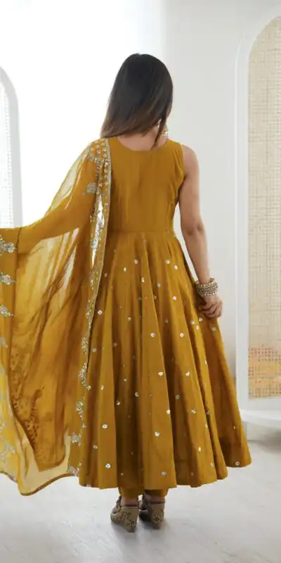 JF 038 Mustered Roman Silk Gown with Embroidery Work. Wedding, Party, Festive, Events, Navratri, Exclusive Offer ₹2149. Delivery 4-6 Working Days. Shop now. | Bollywood Gowns, Creative Gowns, Designer Gowns, Embroidered Gowns, Gowns, Party Wear Gowns