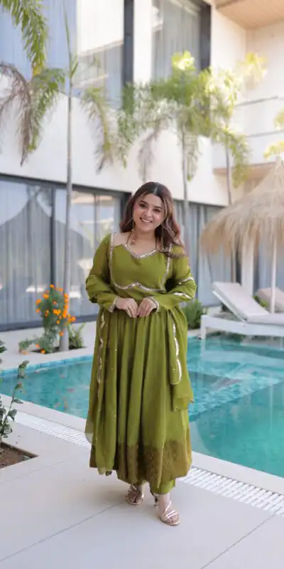 KA 1237 Mehendi Mul Chanderi Anarkali Suit with Embroidery Work & Mirror Work. Grab it for ₹2449. Delivery 4-6 Working Days. Shop now. | Anarkali Suits, Bollywood Anarkali, Creative-Anarkali, Designer Anarkali, Embroidered Anarkali, Party Wear Anarkali