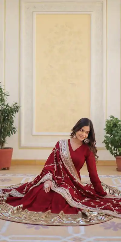 KA 1082 Maroon Faux Blooming Gown with Embroidery Work & Zari Work. Available at ₹3149 only. Delivery 4-6 Working Days. Shop now. | Bollywood Gowns, Creative Gowns, Designer Gowns, Embroidered Gowns, Gowns, Party Wear Gowns