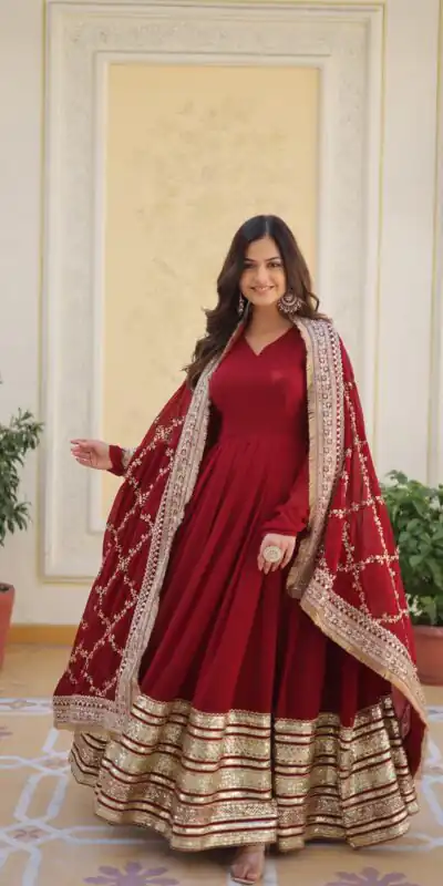 KA 1082 Maroon Faux Blooming Gown with Embroidery Work & Zari Work. Available at ₹3149 only. Delivery 4-6 Working Days. Shop now. | Bollywood Gowns, Creative Gowns, Designer Gowns, Embroidered Gowns, Gowns, Party Wear Gowns