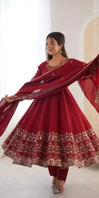 ZF 5016 Maroon Roman Silk Gown with Embroidery Work. Wedding, Party, Festive, Events, Navratri, Exclusive Offer ₹2499. Delivery 4-6 Working Days. Shop now. | Bollywood Gowns, Creative Gowns, Designer Gowns, Embroidered Gowns, Gowns, Party Wear Gowns