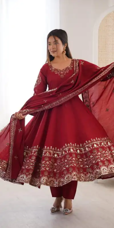 ZF 5016 Maroon Roman Silk Gown with Embroidery Work. Wedding, Party, Festive, Events, Navratri, Exclusive Offer ₹2499. Delivery 4-6 Working Days. Shop now. | Bollywood Gowns, Creative Gowns, Designer Gowns, Embroidered Gowns, Gowns, Party Wear Gowns