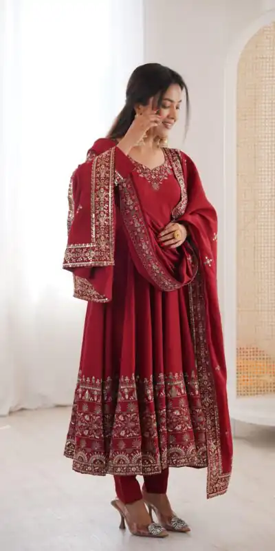 ZF 5016 Maroon Roman Silk Gown with Embroidery Work. Wedding, Party, Festive, Events, Navratri, Exclusive Offer ₹2499. Delivery 4-6 Working Days. Shop now. | Bollywood Gowns, Creative Gowns, Designer Gowns, Embroidered Gowns, Gowns, Party Wear Gowns