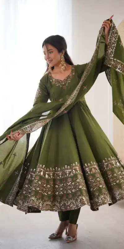 ZF 5016 Mehendi Roman Silk Gown with Embroidery Work. Wedding, Party, Festive, Events, Navratri, Exclusive Offer ₹2499. Delivery 4-6 Working Days. Shop now. | Bollywood Gowns, Creative Gowns, Designer Gowns, Embroidered Gowns, Gowns, Party Wear Gowns