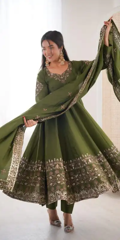 ZF 5016 Mehendi Roman Silk Gown with Embroidery Work. Wedding, Party, Festive, Events, Navratri, Exclusive Offer ₹2499. Delivery 4-6 Working Days. Shop now. | Bollywood Gowns, Creative Gowns, Designer Gowns, Embroidered Gowns, Gowns, Party Wear Gowns