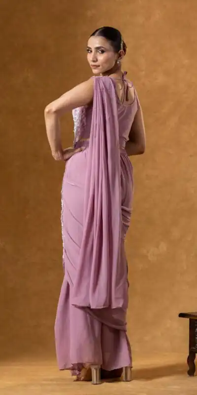 ST 1165 Onion Faux Georgette Saree with Embroidery Work & Sequins Work. Now at just ₹1799. Delivery 4-6 Working Days. Shop now. | Creative Sarees, Bollywood Sarees, Designer Sarees, Embroidered Sarees, Ethnic Saree, Modern Digital sarees, Party Wear Sarees, Sarees