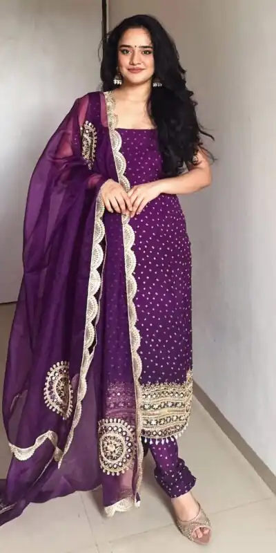 ST 1142 Purple Faux Georgette Salwar Suit with Mirror Work & Embroidery Work. Introductory Price ₹2449. Delivery 4-6 Working Days. Shop now. | Casual Suits, Jump Suits, Creative suits, Designer Suits, Palazzo Suits, Party Wear Suits, Patiala Suits, Salwar suit, Straight Suits