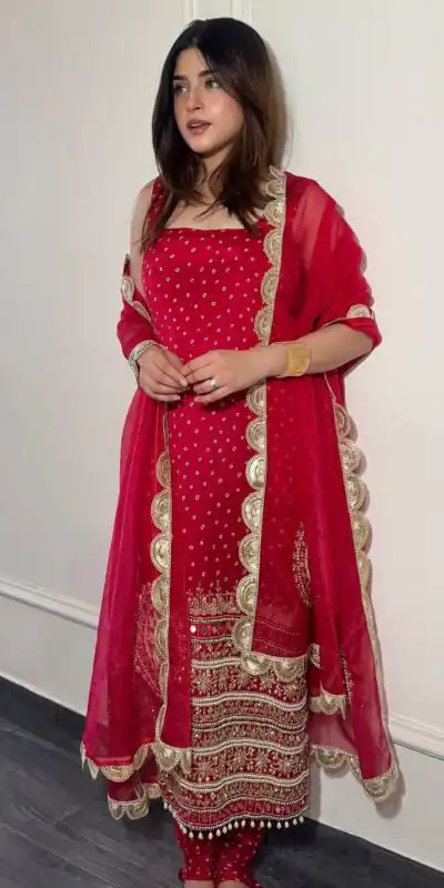 ST 1142 Red Faux Georgette Salwar Suit with Mirror Work & Embroidery Work. Introductory Price ₹2449. Delivery 4-6 Working Days. Shop now. | Casual Suits, Jump Suits, Creative suits, Designer Suits, Palazzo Suits, Party Wear Suits, Patiala Suits, Salwar suit, Straight Suits