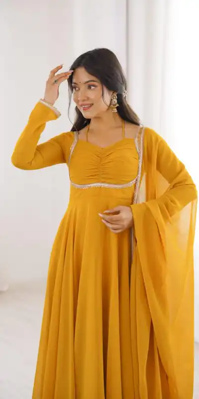 KB 291 Yellow Color Fox Blooming Georgette Gown with Lace Work. Affordable Price ₹1899. Delivery 4-6 Working Days. Shop now. | Bollywood Gowns, Creative Gowns, Designer Gowns, Embroidered Gowns, Gowns, Party Wear Gowns