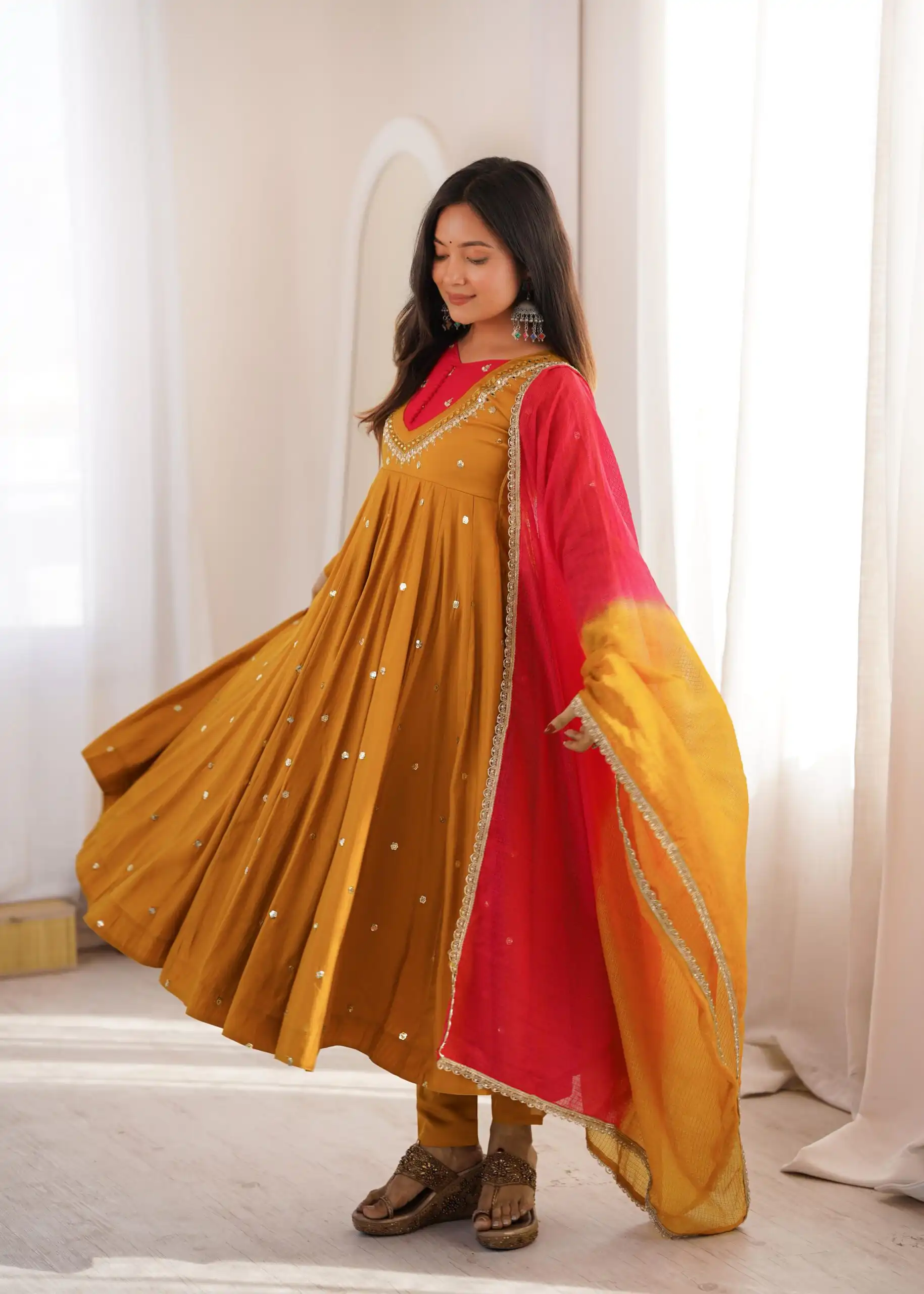 ZF 5023 Mustered Roman Silk Gown with Mirror Work & Embroidery Work. Special Price ₹2099. Delivery 4-6 Working Days. Shop now. | Bollywood Gowns, Creative Gowns, Designer Gowns, Embroidered Gowns, Gowns, Party Wear Gowns