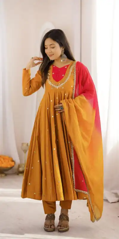 ZF 5023 Mustered Roman Silk Gown with Mirror Work & Embroidery Work. Special Price ₹2099. Delivery 4-6 Working Days. Shop now. | Bollywood Gowns, Creative Gowns, Designer Gowns, Embroidered Gowns, Gowns, Party Wear Gowns
