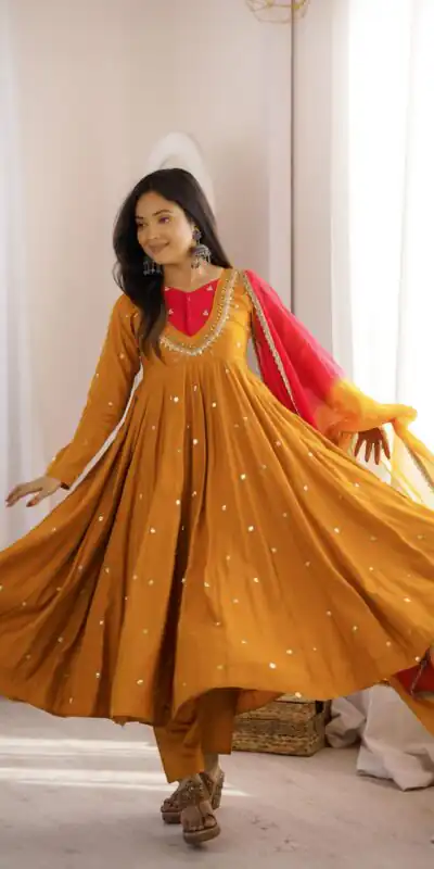 ZF 5023 Mustered Roman Silk Gown with Mirror Work & Embroidery Work. Special Price ₹2099. Delivery 4-6 Working Days. Shop now. | Bollywood Gowns, Creative Gowns, Designer Gowns, Embroidered Gowns, Gowns, Party Wear Gowns