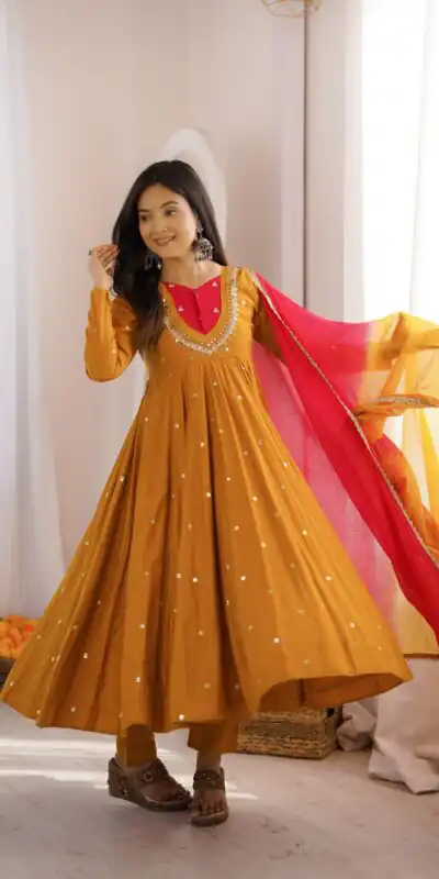 ZF 5023 Mustered Roman Silk Gown with Mirror Work & Embroidery Work. Special Price ₹2099. Delivery 4-6 Working Days. Shop now. | Bollywood Gowns, Creative Gowns, Designer Gowns, Embroidered Gowns, Gowns, Party Wear Gowns