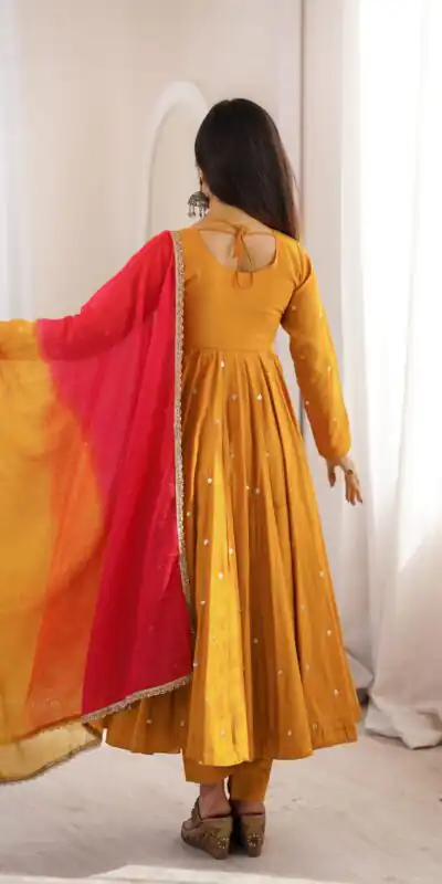 ZF 5023 Mustered Roman Silk Gown with Mirror Work & Embroidery Work. Special Price ₹2099. Delivery 4-6 Working Days. Shop now. | Bollywood Gowns, Creative Gowns, Designer Gowns, Embroidered Gowns, Gowns, Party Wear Gowns