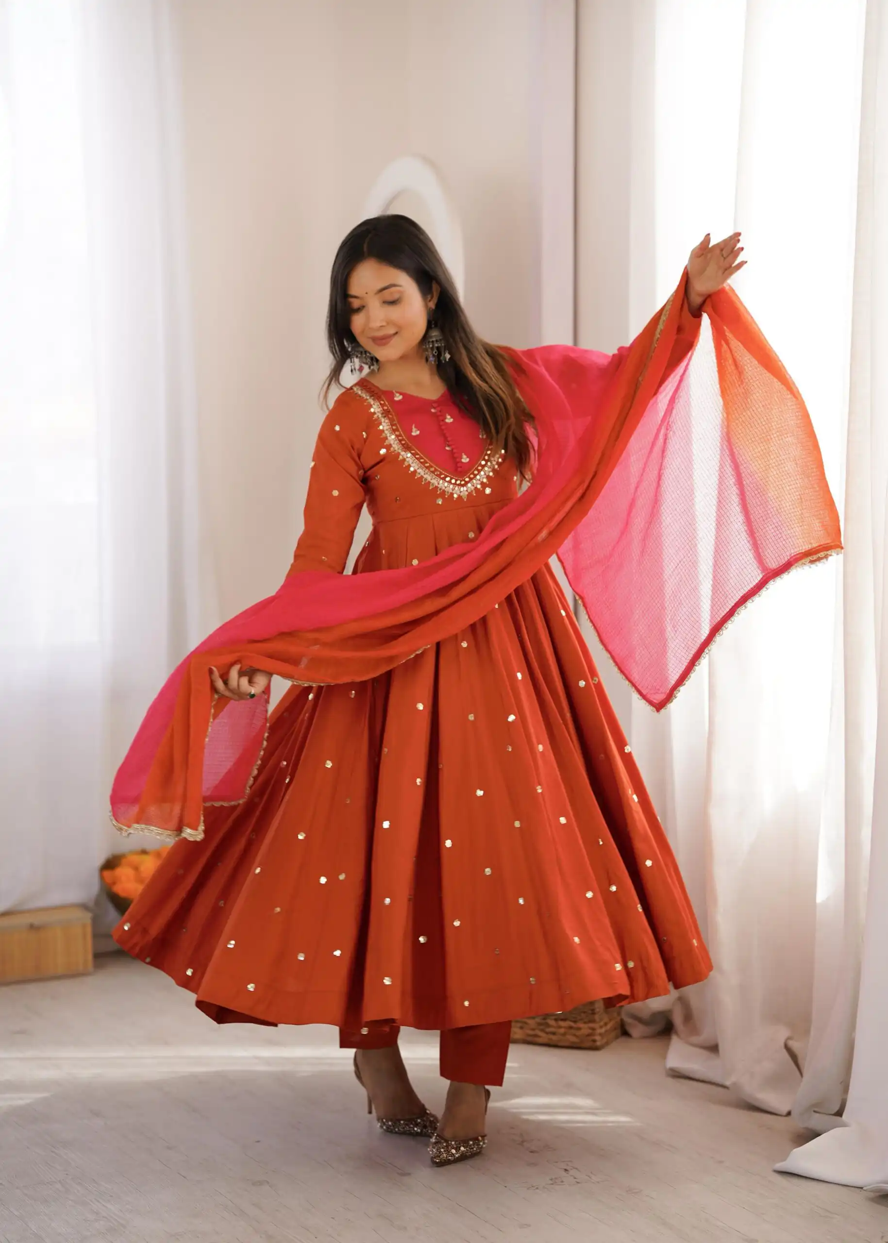 ZF 5023 Rust Roman Silk Gown with Mirror Work & Embroidery Work. Special Price ₹2099. Delivery 4-6 Working Days. Shop now. | Bollywood Gowns, Creative Gowns, Designer Gowns, Embroidered Gowns, Gowns, Party Wear Gowns