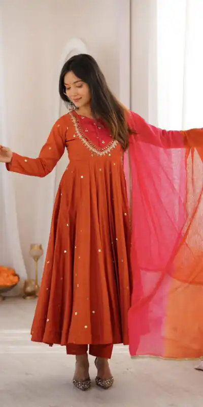 ZF 5023 Rust Roman Silk Gown with Mirror Work & Embroidery Work. Special Price ₹2099. Delivery 4-6 Working Days. Shop now. | Bollywood Gowns, Creative Gowns, Designer Gowns, Embroidered Gowns, Gowns, Party Wear Gowns