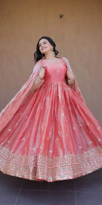 KA 1260 Gajri Color Fendi Silk Gown with Embroidery Work & Zari Work. Now at just ₹2599. Delivery 4-6 Working Days. Shop now. | Bollywood Gowns, Creative Gowns, Designer Gowns, Embroidered Gowns, Gowns, Party Wear Gowns