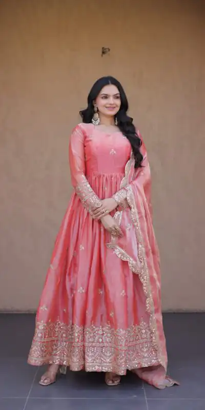 KA 1260 Gajri Color Fendi Silk Gown with Embroidery Work & Zari Work. Now at just ₹2599. Delivery 4-6 Working Days. Shop now. | Bollywood Gowns, Creative Gowns, Designer Gowns, Embroidered Gowns, Gowns, Party Wear Gowns