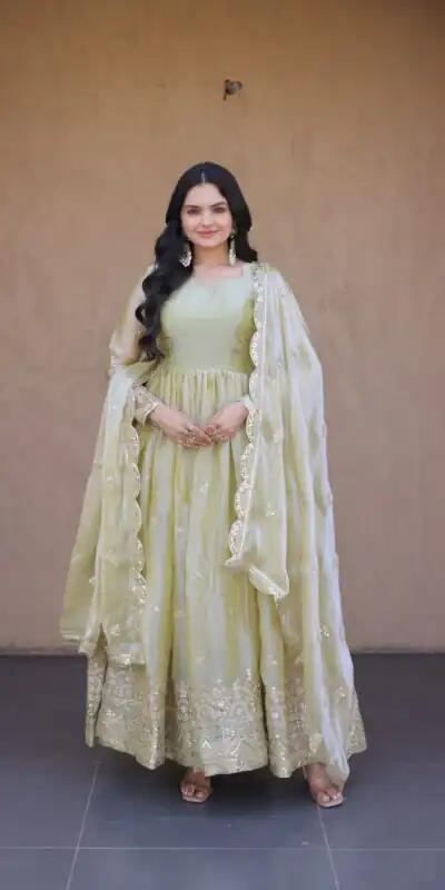 KA 1260 Light Pista Color Fendi Silk Gown with Embroidery Work & Zari Work. Now at just ₹2599. Delivery 4-6 Working Days. Shop now. | Bollywood Gowns, Creative Gowns, Designer Gowns, Embroidered Gowns, Gowns, Party Wear Gowns