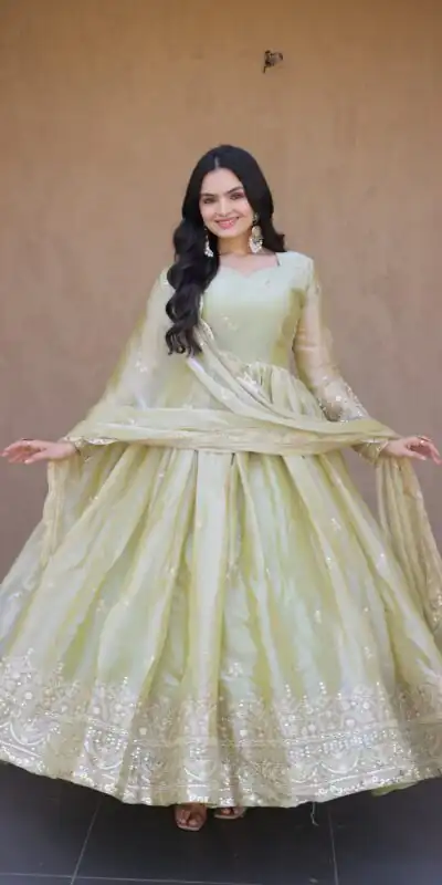 KA 1260 Light Pista Color Fendi Silk Gown with Embroidery Work & Zari Work. Now at just ₹2599. Delivery 4-6 Working Days. Shop now. | Bollywood Gowns, Creative Gowns, Designer Gowns, Embroidered Gowns, Gowns, Party Wear Gowns